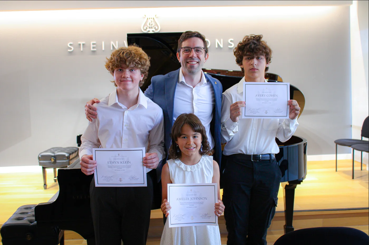 Ethyn, Amelia, and Avery with Dr. Michael Guida